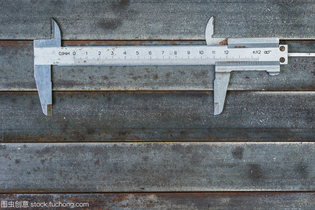 測量工具,金屬背景。背景紋理